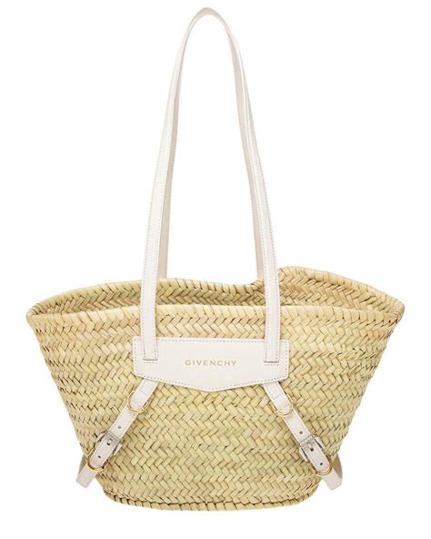 Small Voyou basket bag in raffia .